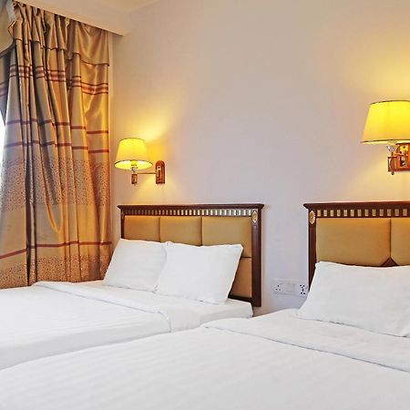 Super Oyo 90464 Borneo Suites Hotel โกตาคินาบาลู ภายนอก รูปภาพ