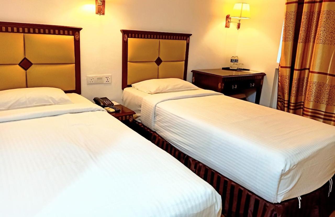 Super Oyo 90464 Borneo Suites Hotel โกตาคินาบาลู ภายนอก รูปภาพ