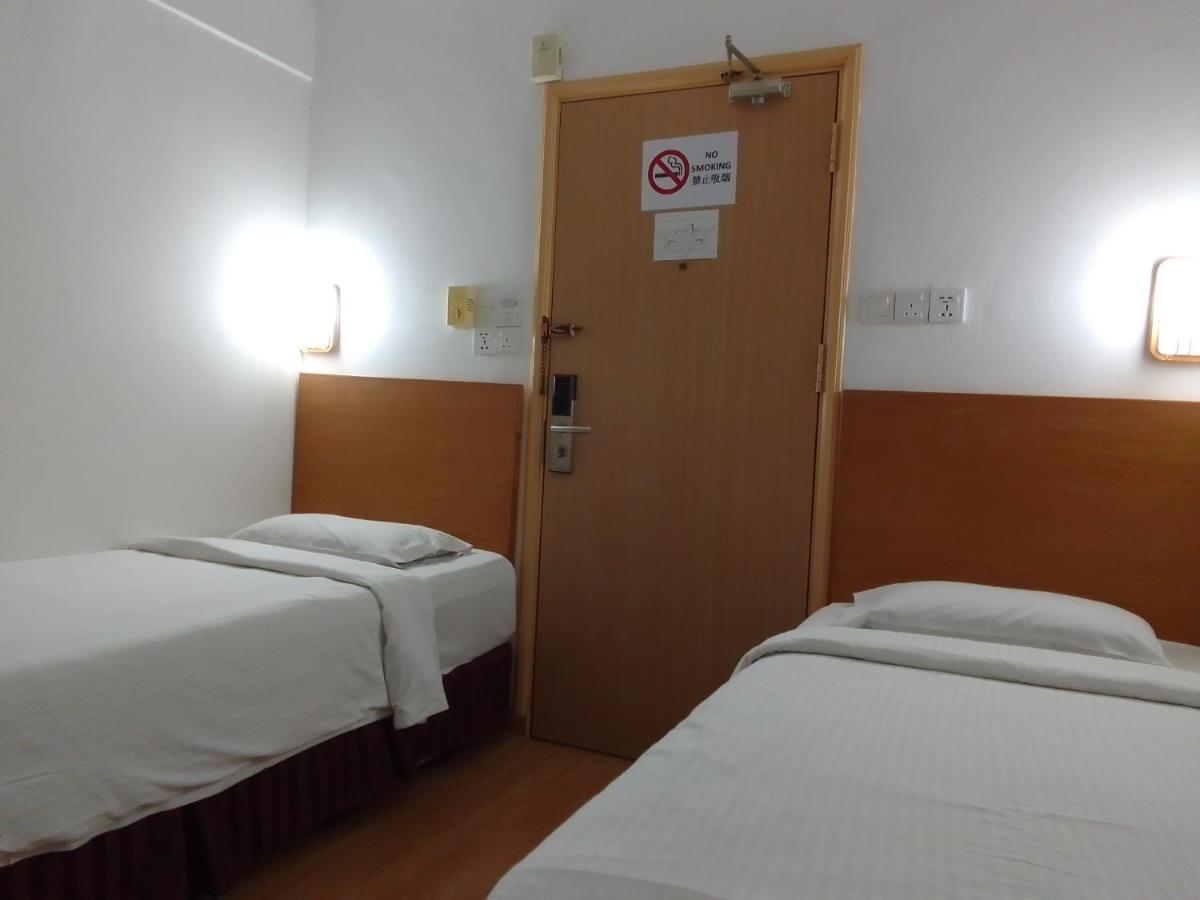 Super Oyo 90464 Borneo Suites Hotel โกตาคินาบาลู ภายนอก รูปภาพ
