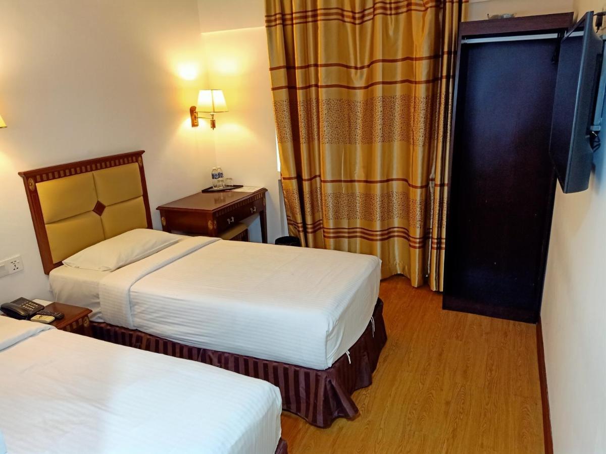 Super Oyo 90464 Borneo Suites Hotel โกตาคินาบาลู ภายนอก รูปภาพ