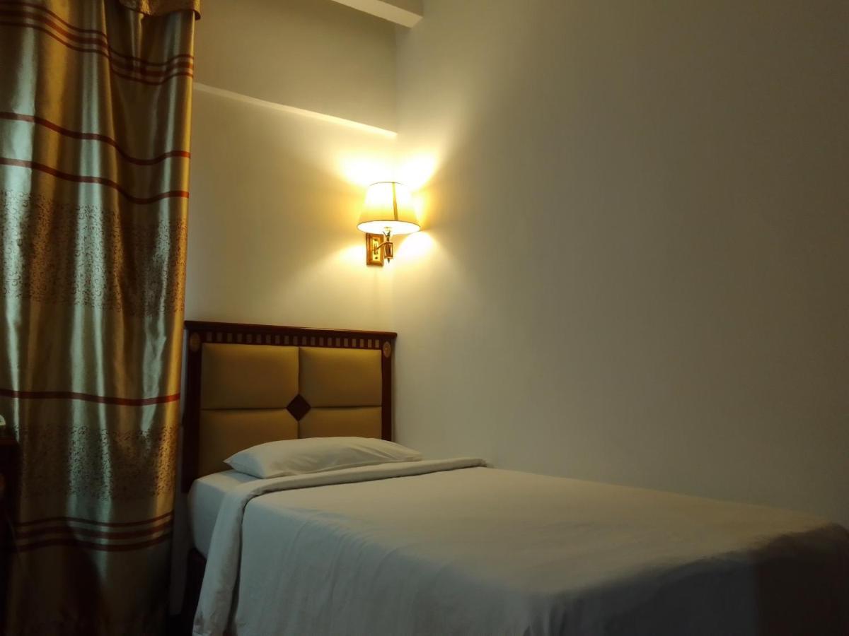 Super Oyo 90464 Borneo Suites Hotel โกตาคินาบาลู ภายนอก รูปภาพ