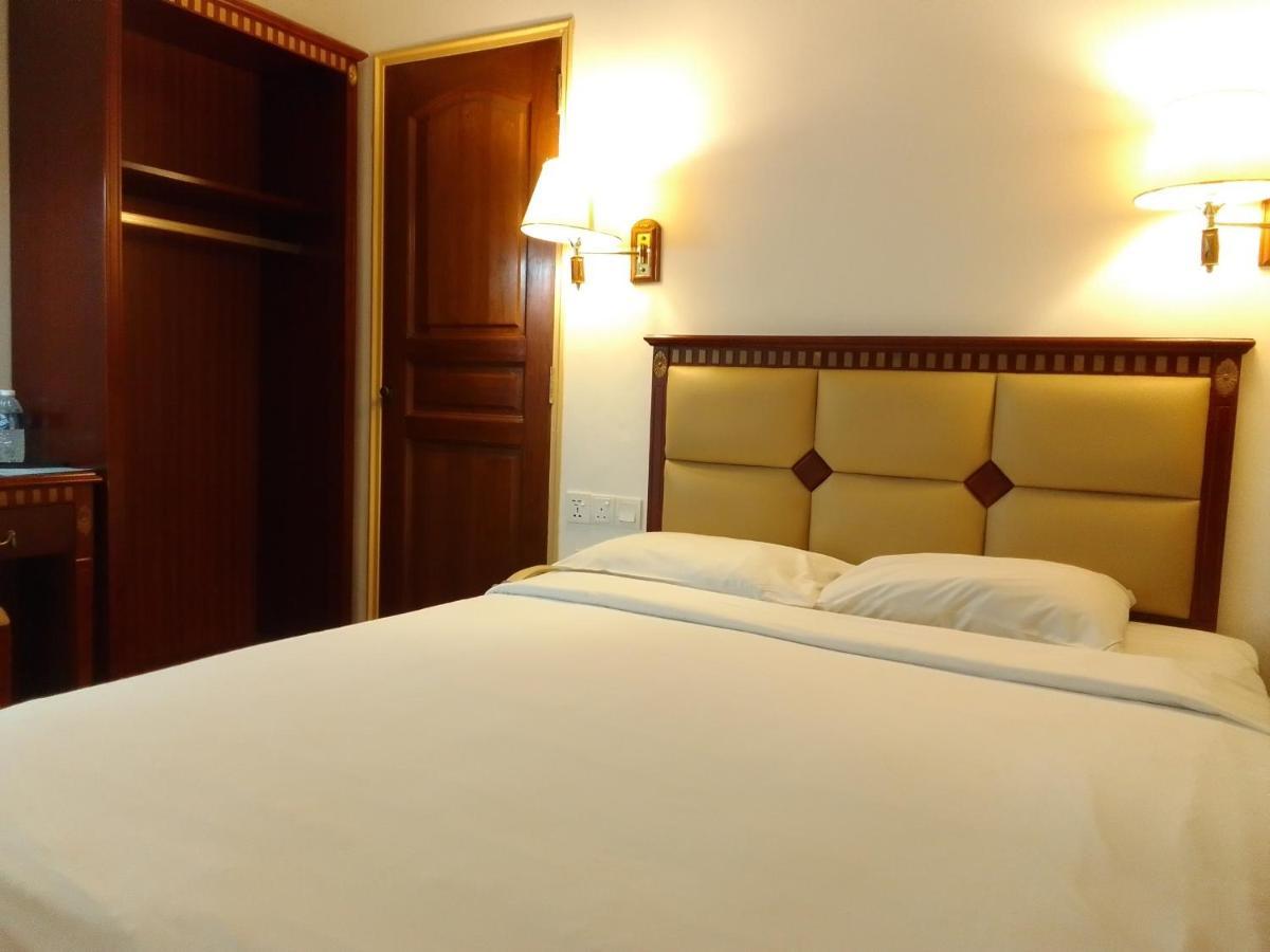 Super Oyo 90464 Borneo Suites Hotel โกตาคินาบาลู ภายนอก รูปภาพ