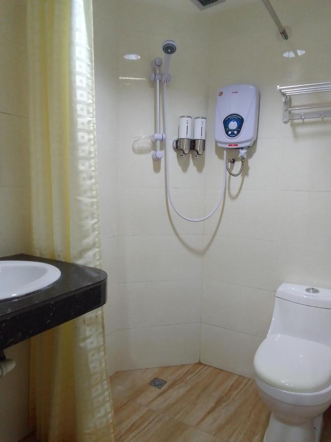 Super Oyo 90464 Borneo Suites Hotel โกตาคินาบาลู ภายนอก รูปภาพ