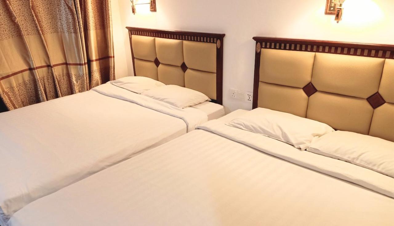 Super Oyo 90464 Borneo Suites Hotel โกตาคินาบาลู ภายนอก รูปภาพ