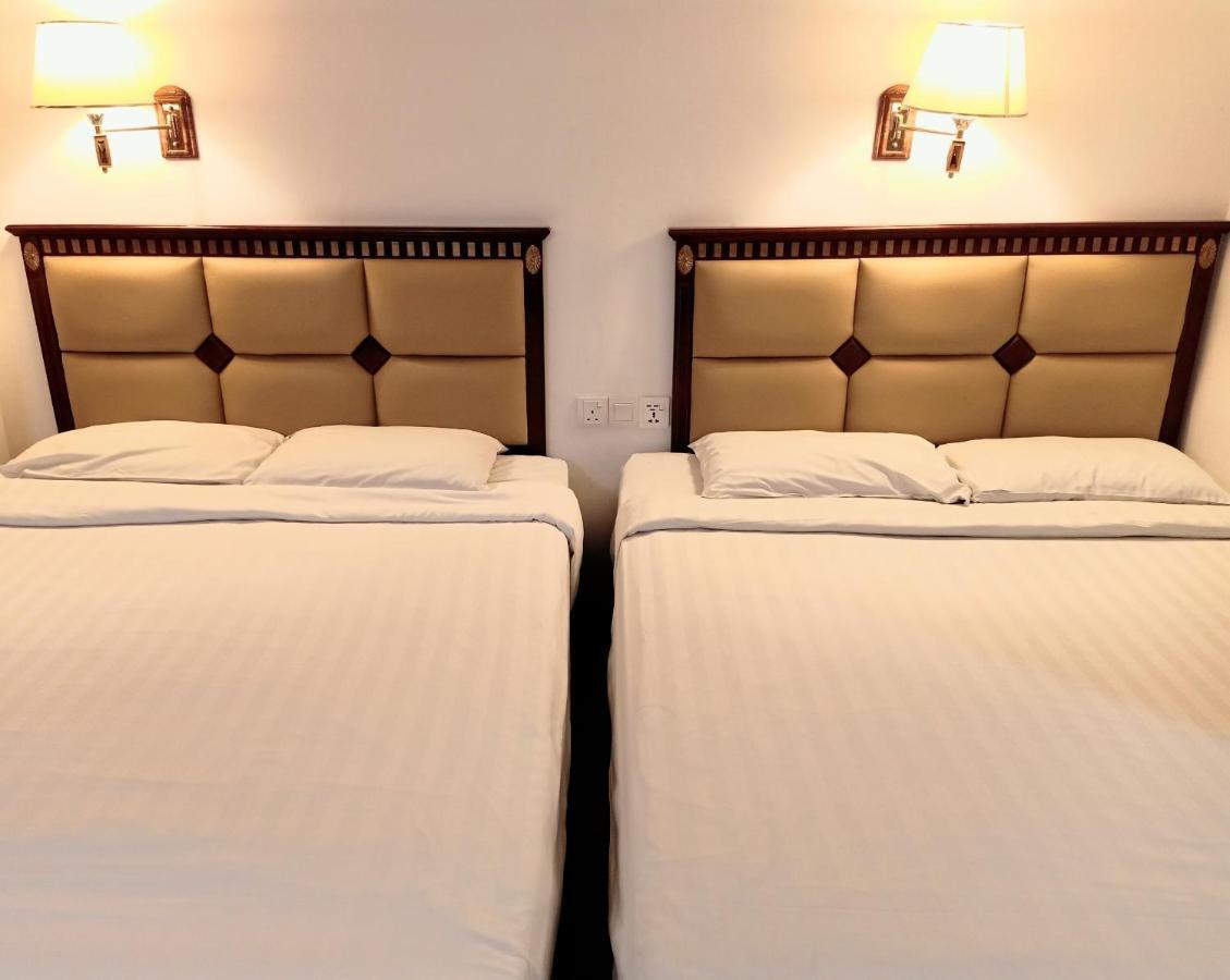 Super Oyo 90464 Borneo Suites Hotel โกตาคินาบาลู ภายนอก รูปภาพ