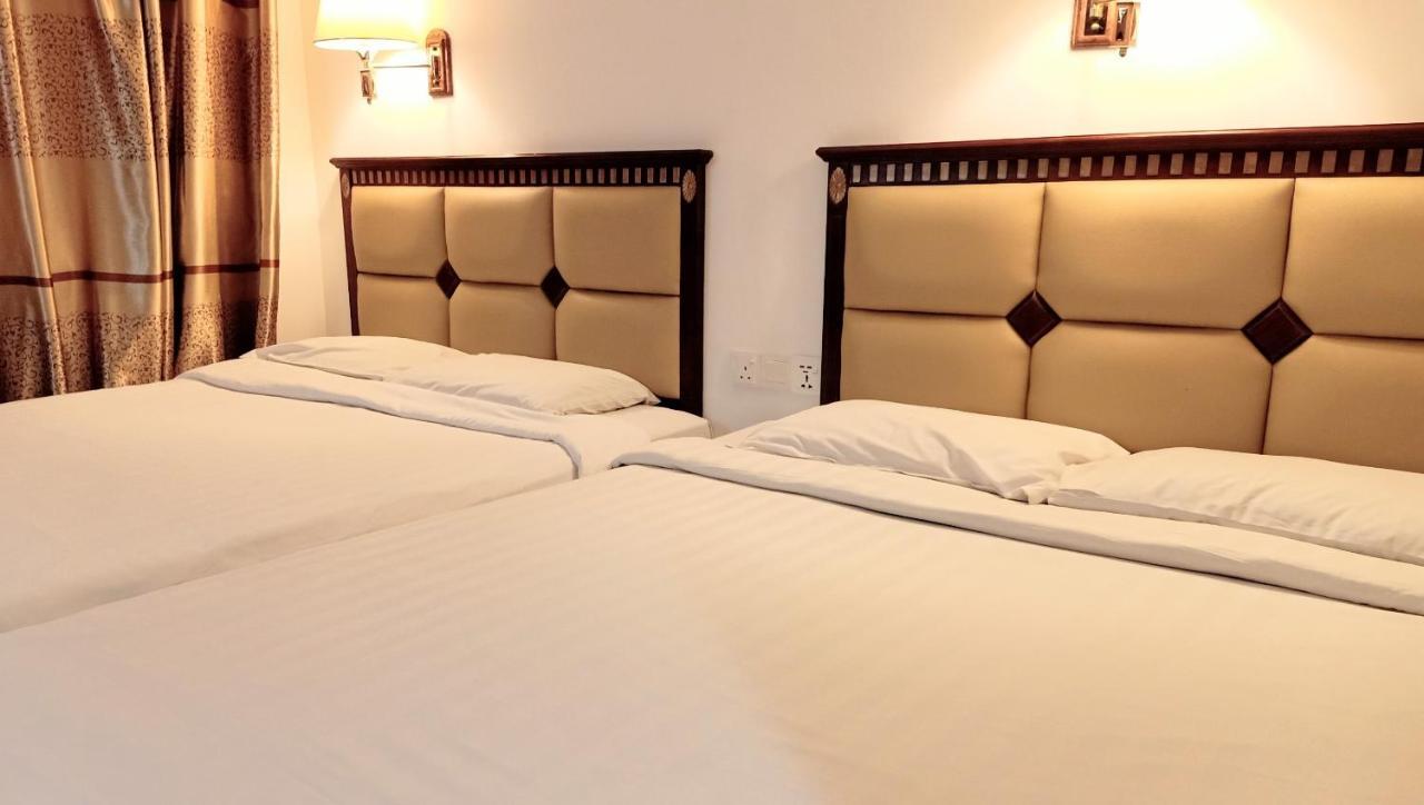 Super Oyo 90464 Borneo Suites Hotel โกตาคินาบาลู ภายนอก รูปภาพ