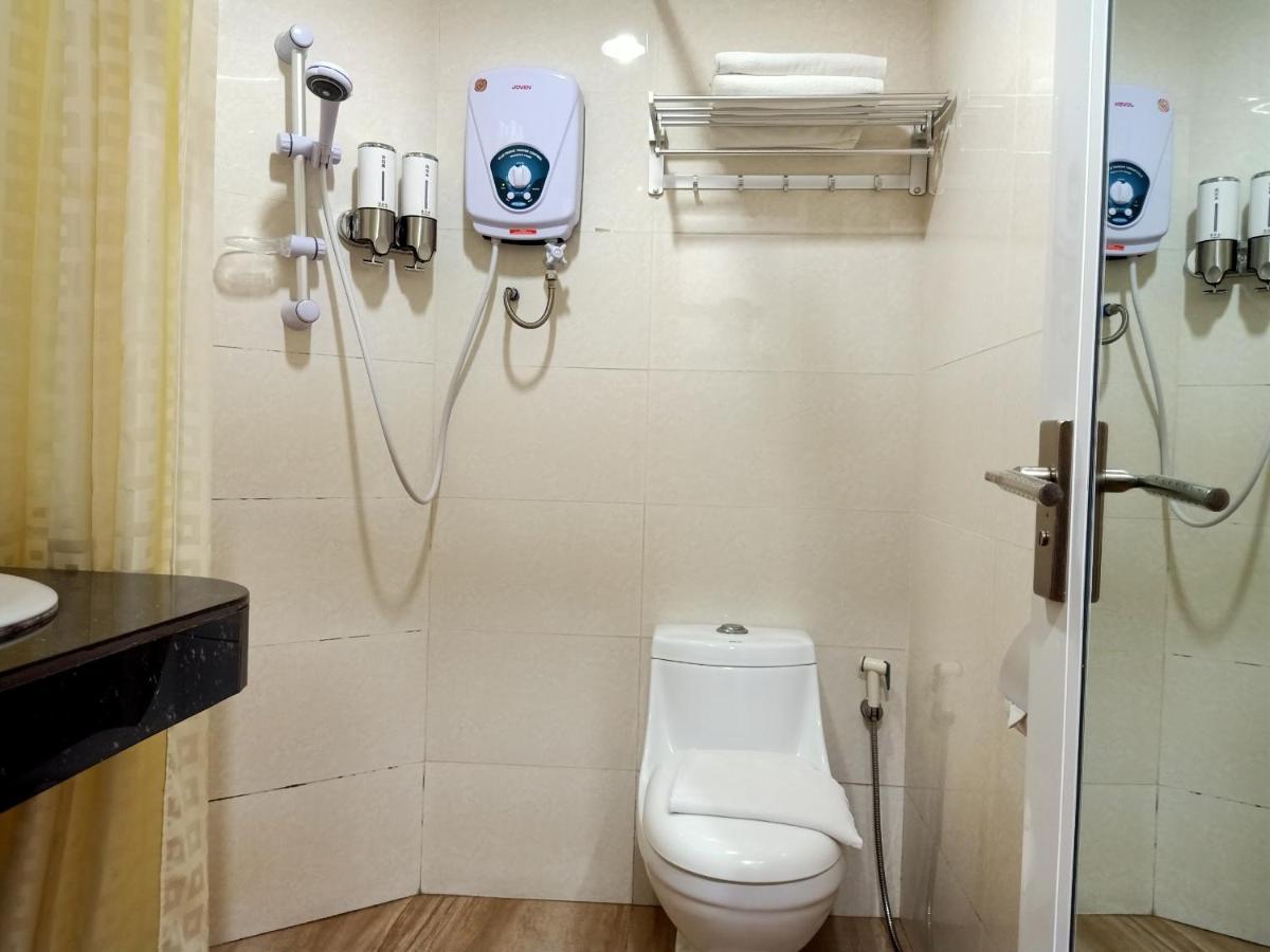Super Oyo 90464 Borneo Suites Hotel โกตาคินาบาลู ภายนอก รูปภาพ