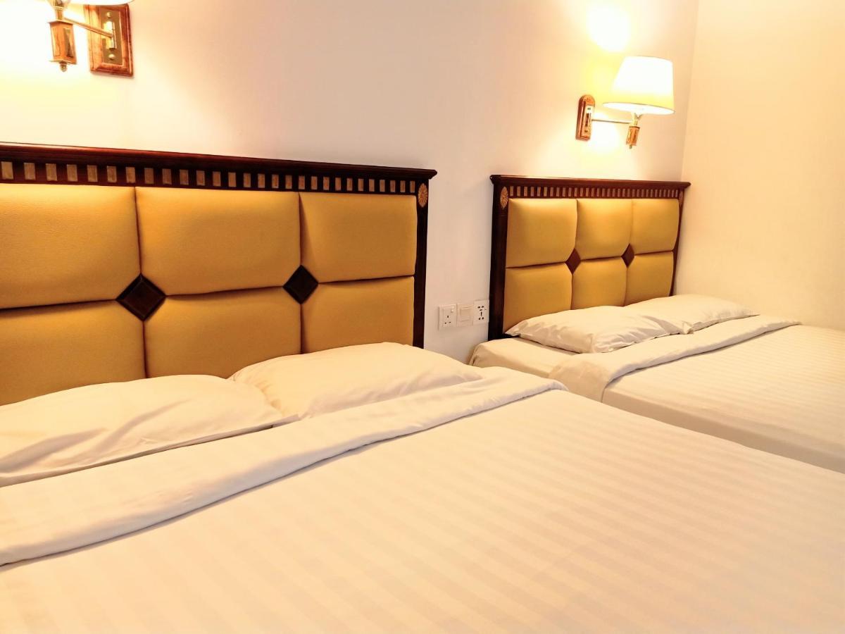 Super Oyo 90464 Borneo Suites Hotel โกตาคินาบาลู ภายนอก รูปภาพ