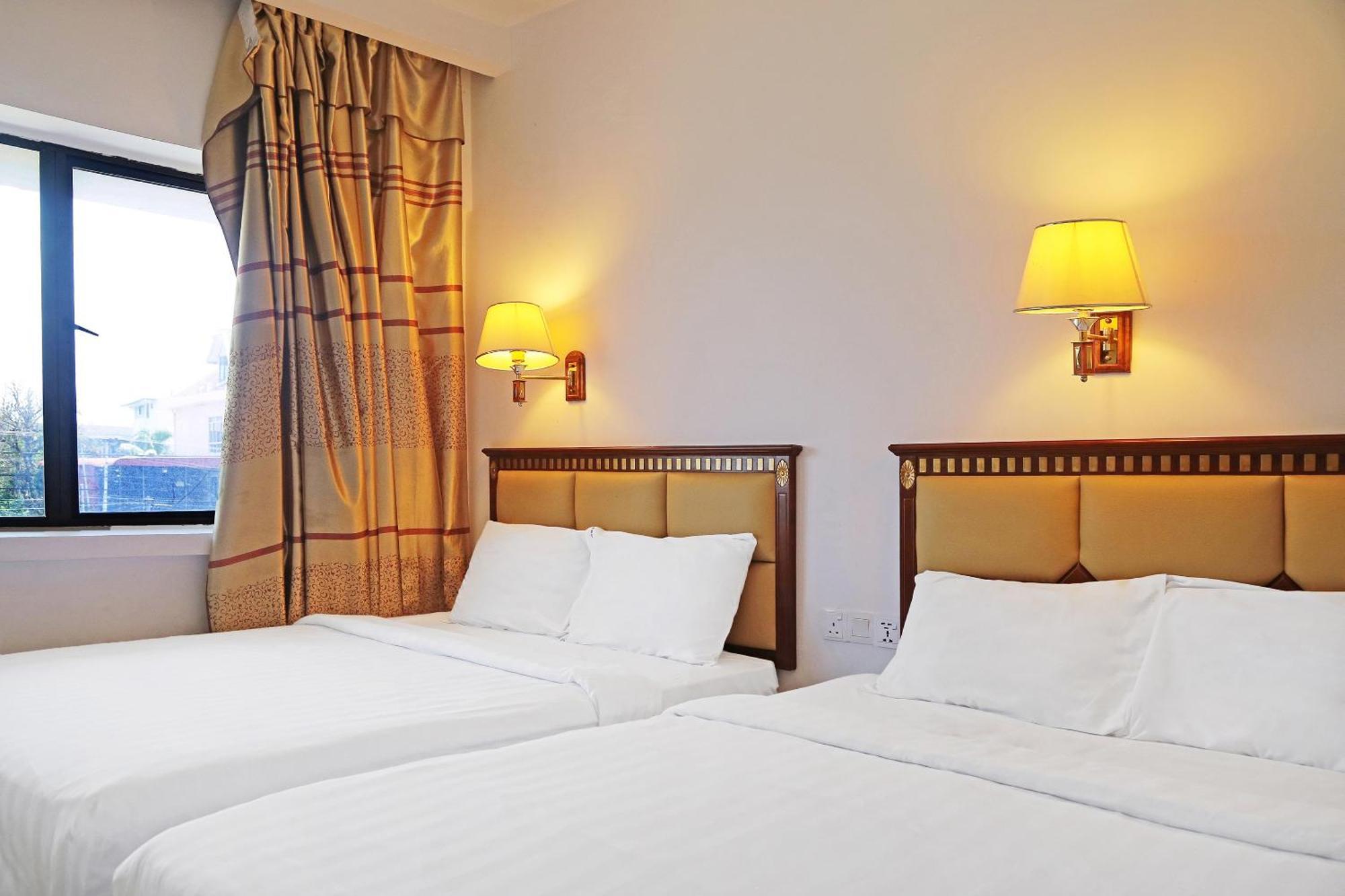 Super Oyo 90464 Borneo Suites Hotel โกตาคินาบาลู ภายนอก รูปภาพ